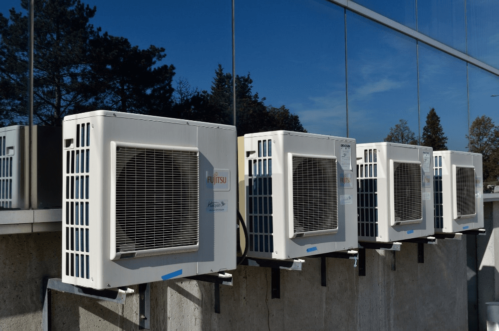 Outdoor AC compressors.